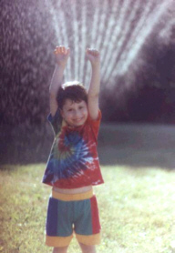In the sprinkler when I was five